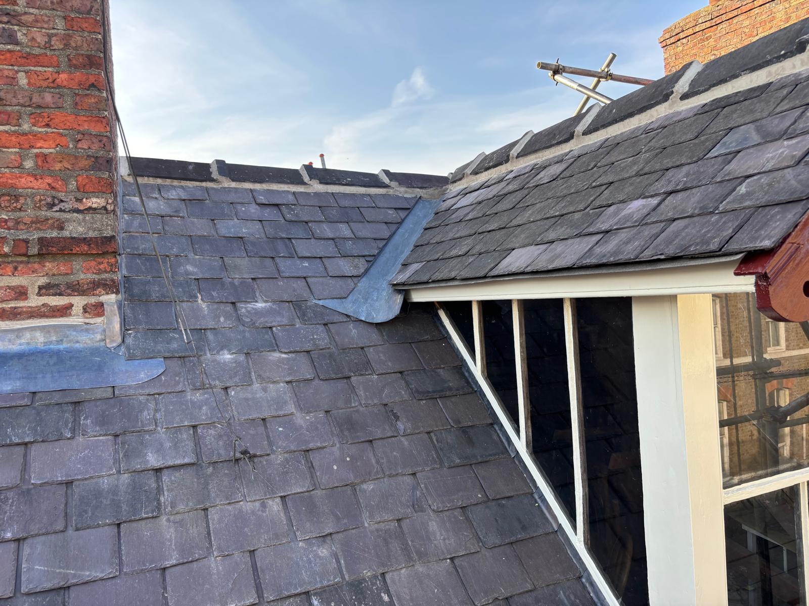 New slate roof with two Velux roof windows installed by EJL in York