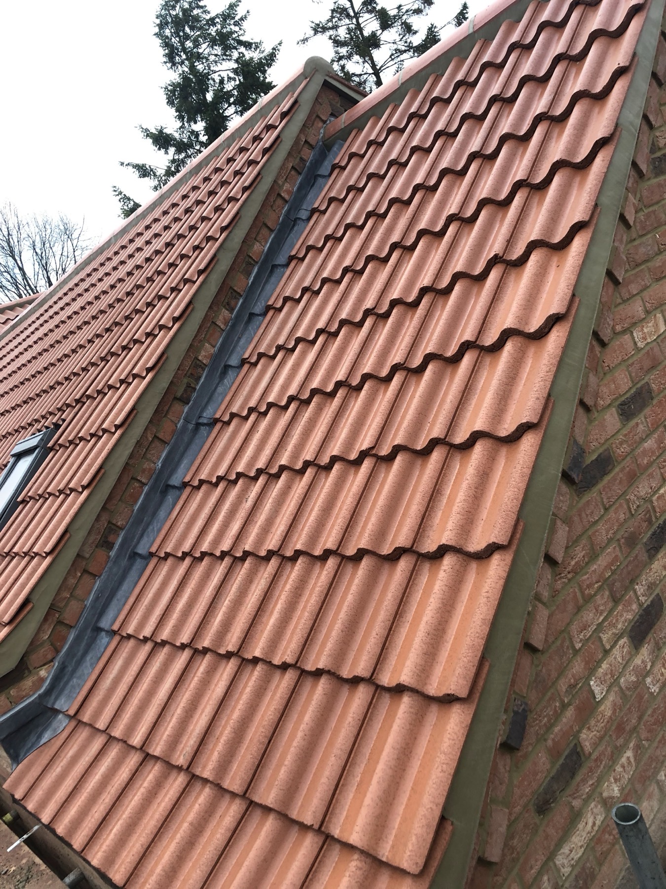 Terracotta clay pantile roof slope laid by EJL Roofing