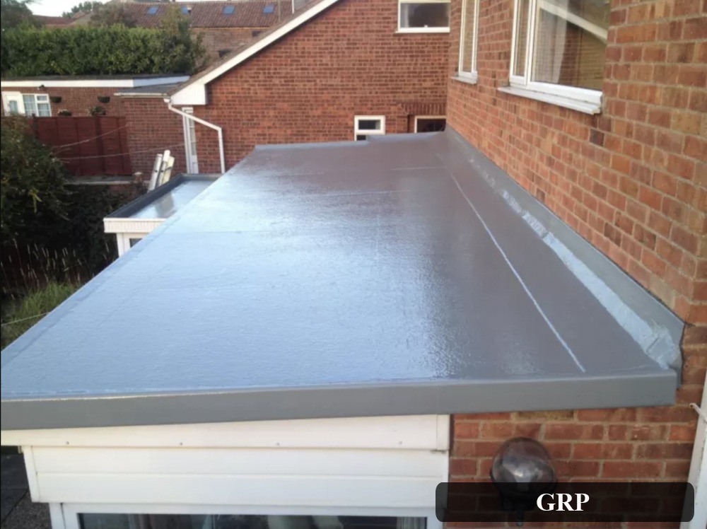 Grey GRP fibreglass flat roof on a brick extension in York