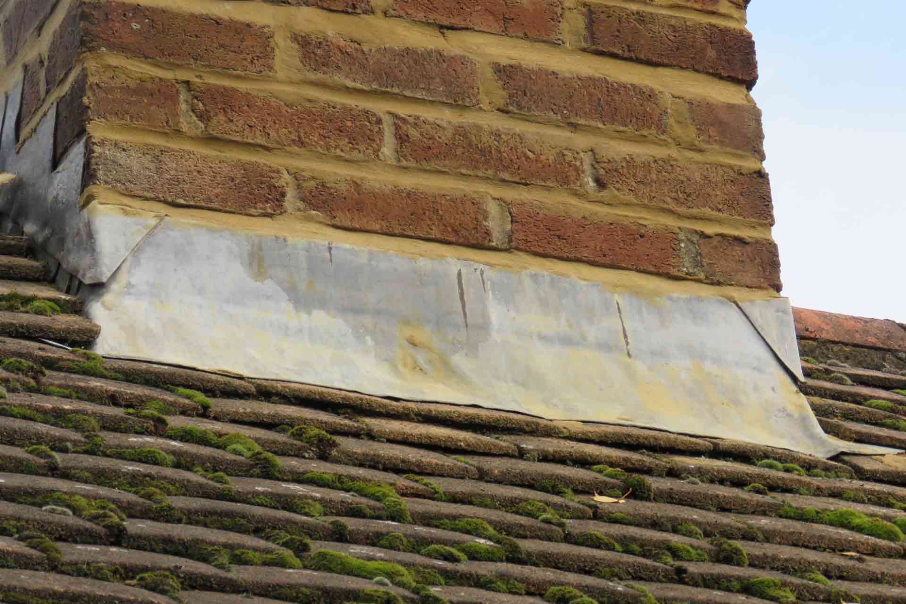 Weathered lead on an older York chimney stack