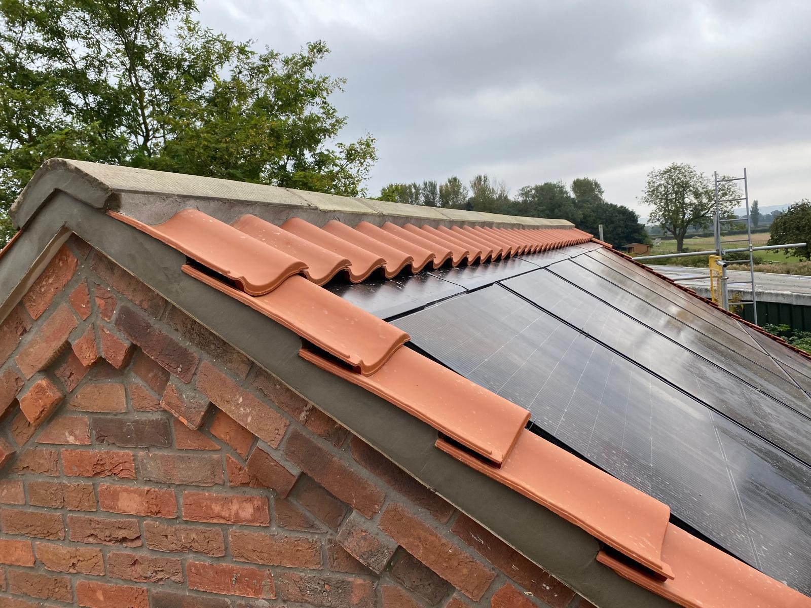 In-roof solar panels integrated with terracotta clay tiles