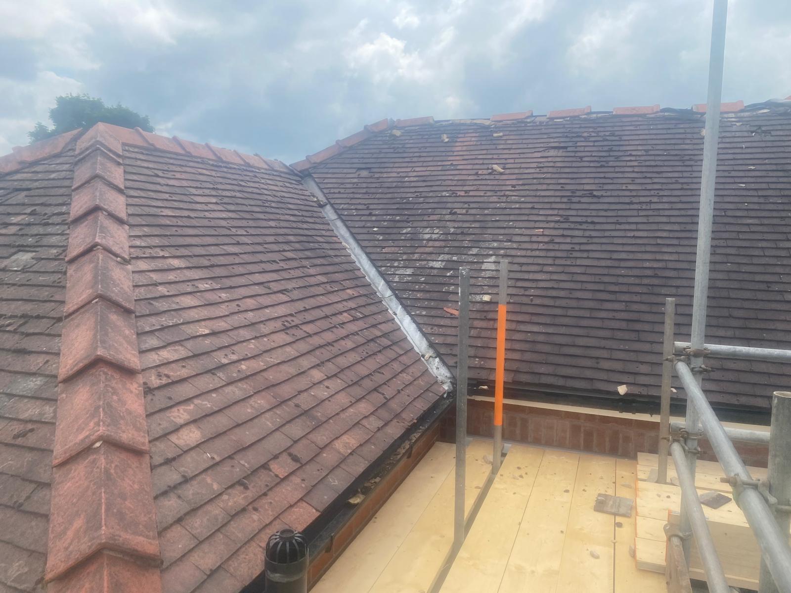 Lead valley and flashing repair under scaffold on a Fulford roof